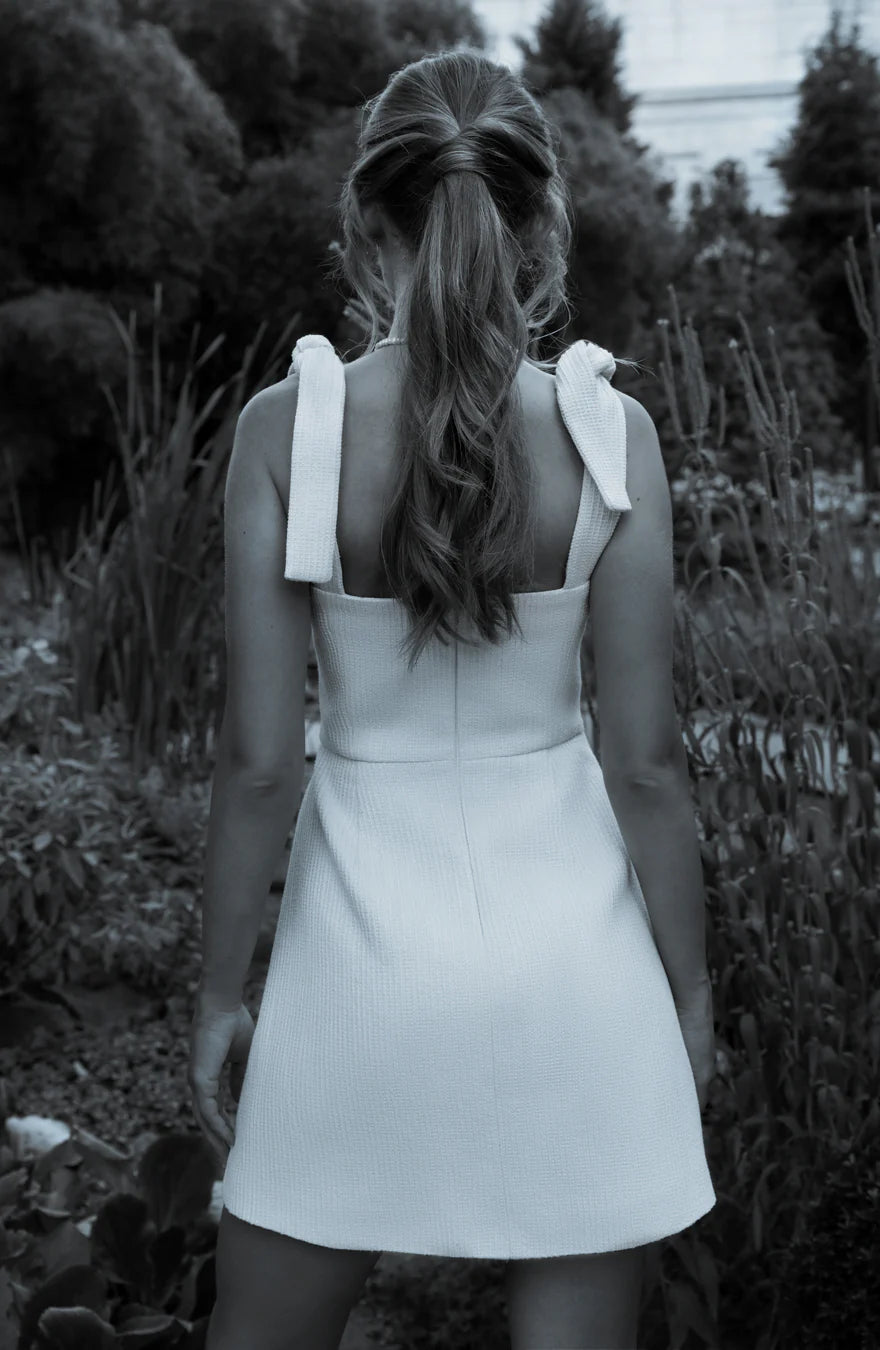 “Siren” pearl dress with bows by Airène