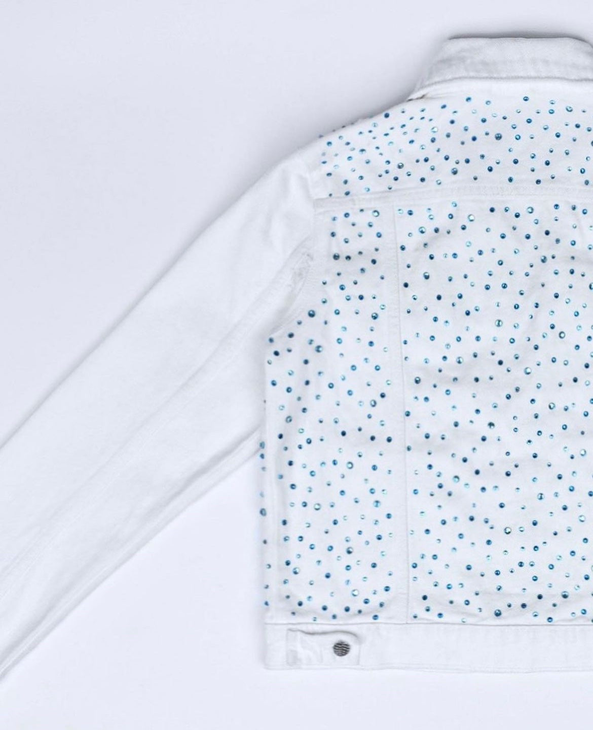 White denim jacket with blue pebbles