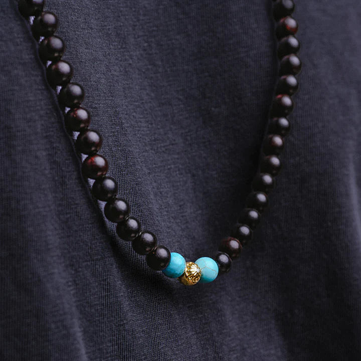 NECKLACE WITH EBONY WOOD, SANDAL WOOD AND TURQUOISE IN GOLD