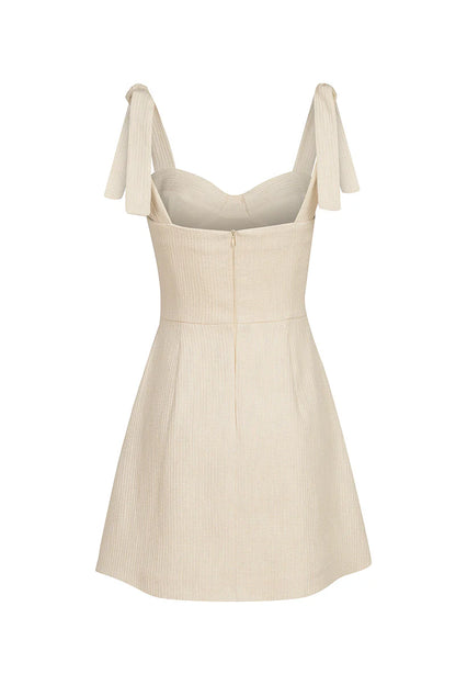 “Siren” pearl dress with bows by Airène